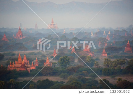 View of the pagodas in the morning mist from the Bagan Viewing Tower, Bagan, Myanmar View of the pagodas in the morning mist from the Bagan Viewing Tower, Bagan, Myanmar 132901962
