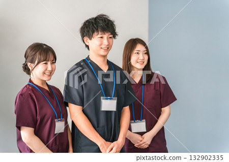 Doctors, doctors and nurses wearing scrubs Doctors, doctors and nurses wearing scrubs 132902335