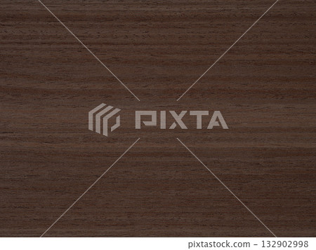 Rich walnut hues blend seamlessly in the fine-grained texture of this elegant veneer surface 132902998