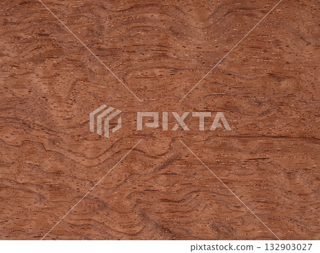 Bubinga pommele veneer with undulating grain patterns and warm terracotta tones Bubinga pommele veneer with undulating grain patterns and warm terracotta tones 132903027
