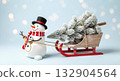 Snowman wearing a hat and scarf pulls a sled with a snowy Christmas tree on a light blue background with bokeh lights. 132904564