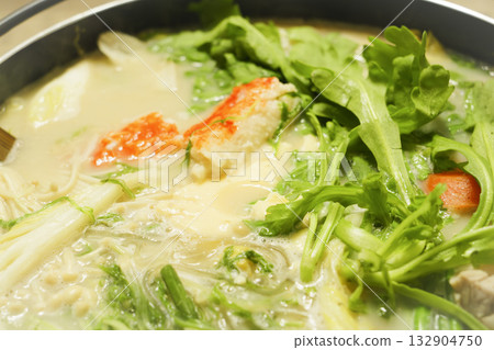 Hot pot dishes made with plenty of chicken, white fish, and vegetables—a warm winter treat Hot pot dishes made with plenty of chicken, white fish, and vegetables—a warm winter treat 132904750