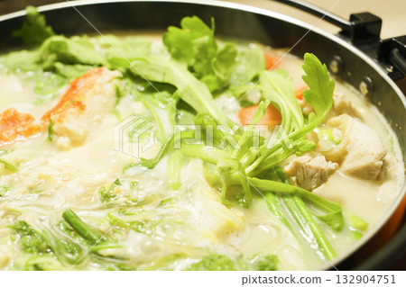 Hot pot dishes made with plenty of chicken, white fish, and vegetables—a warm winter treat 132904751