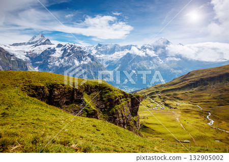 Great view of alpine hill. Location place Swiss alps, Grindelwald valley. Great view of alpine hill. Location place Swiss alps, Grindelwald valley. 132905002