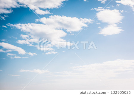 Fantastic view of the azure sky on a sunny day with fluffy clouds. Fantastic view of the azure sky on a sunny day with fluffy clouds. 132905025
