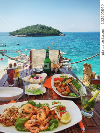Fresh seafood on the table in summer cafe on the Mediterranean coast. Fresh seafood on the table in summer cafe on the Mediterranean coast. 132905049