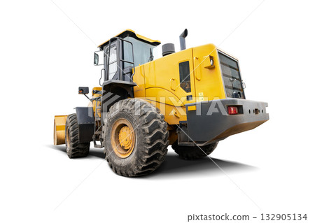 A large yellow construction machine stands prominently against a clean, isolated white background. This powerful equipment is ideal for various design applications A large yellow construction machine stands prominently against a clean, isolated white background. This powerful equipment is ideal for various design applications 132905134