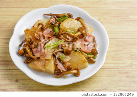 Stir-fried turnip and nameko mushrooms with butter Stir-fried turnip and nameko mushrooms with butter 132905249