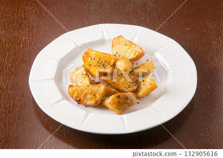 Sweet potato served on a white plate Sweet potato served on a white plate 132905616
