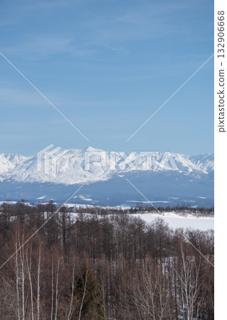 Clear blue winter sky and snowy mountain Tokachidake 132906668