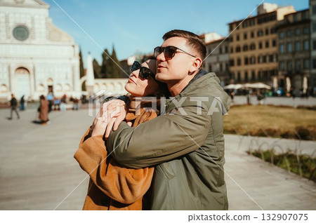 Romantic Couple Embracing in a Historic Square 132907075