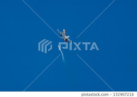 Fighter plane flying while firing flares, F-16, US military Fighter plane flying while firing flares, F-16, US military 132907218