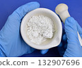 Zinc oxide is an inorganic compound with the formula ZnO. 132907696