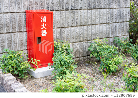 Outdoor red fire extinguisher box 132907699