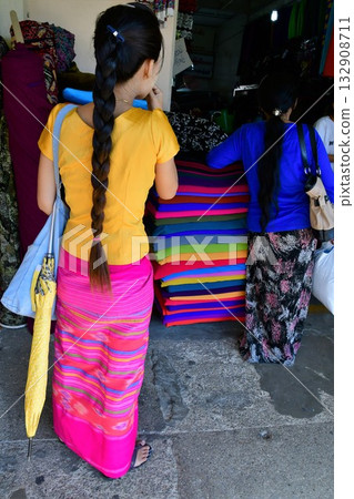 Myanmar, Yangon, Bogyoke Aung San Market, traditional longyi store Myanmar, Yangon, Bogyoke Aung San Market, traditional longyi store 132908711
