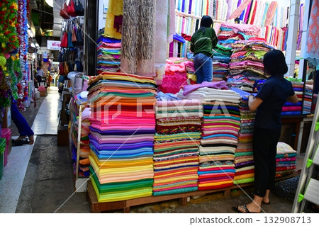 Myanmar, Yangon, Bogyoke Aung San Market, traditional longyi store Myanmar, Yangon, Bogyoke Aung San Market, traditional longyi store 132908713