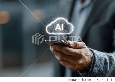 Hand holding phone with glowing AI cloud technology above. 132909121