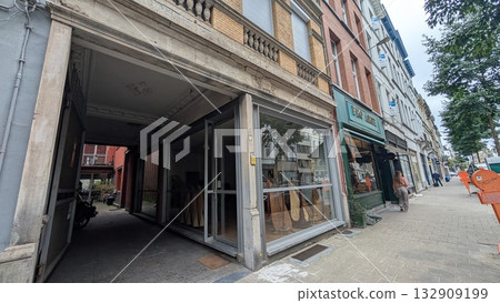 A street with a harp shop in Antwerp 132909199