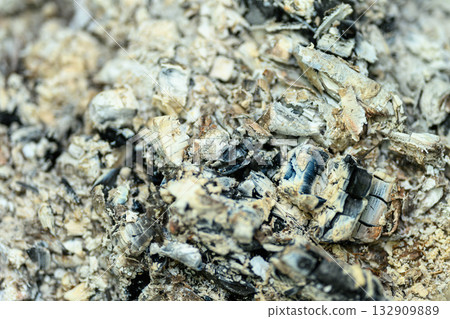 CloseUp View of Natural Ashes and Minerals Displayed in Various Earthy Textures and Tones 132909889
