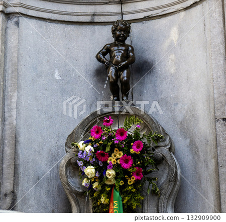The Manneken Pis a famous bronze fountain statue located in Brussels 132909900