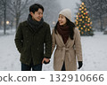 Couple walking in the snow 132910666