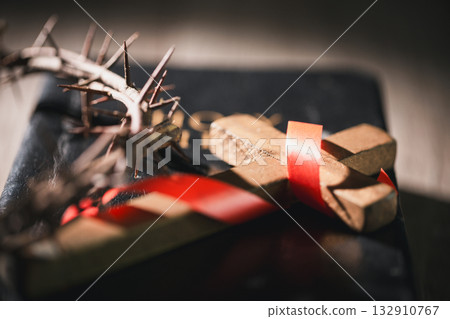 Closeup of Jesus Christ wearing crown of thorns during His crucifixion captures the suffering, sacrifice, and deep spirituality that define Easter and the core of Christian faith and religion. 132910767