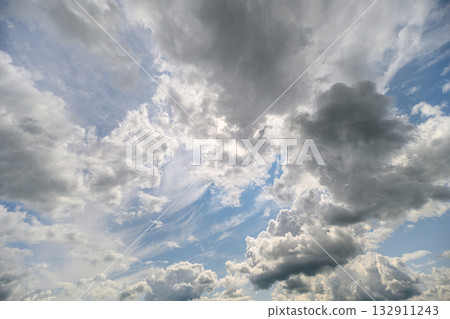 A beautiful dynamic cloudscape against a stunning blue sky that inspires tranquility 132911243