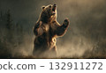 A threatening brown bear in the forest 132911272