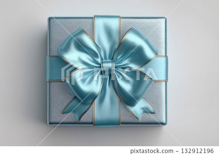 Birthday gift. Blue box wrapped with a bow on white background. Jewelry, birthdays, Christmas and luxury branding. Birthday gift. Blue box wrapped with a bow on white background. Jewelry, birthdays, Christmas and luxury branding. 132912196