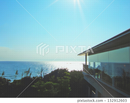 Sagami Bay and modern buildings from Hayama Town. Illustrated photo. 132912603