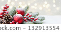 Christmas banner with snowy fir branches, red baubles, pine cones, and berries with blurred golden bokeh lights and falling snow. 132913554