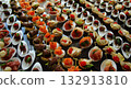 Big set of appetizers on the table settings for the food presentation Big set of appetizers on the table settings for the food presentation 132913810