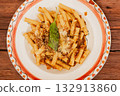 Naples Pasta Genovese a traditional Italian dish served on a decorative plate 132913860