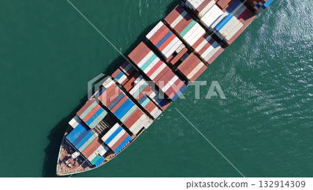 Cargo ship filled with containers in port area 132914309