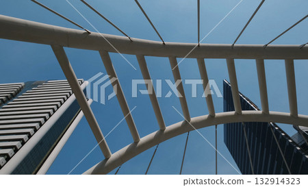Walkway bridge arch and skyscrapers in Bangkok Walkway bridge arch and skyscrapers in Bangkok 132914323