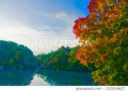 A quiet morning at Lake Goshikinuma and Lake Bishamon, where autumn leaves shine brightly 132914627