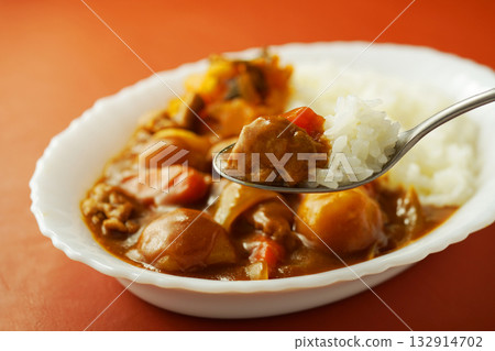 Curry rice with lots of chunky vegetables Curry rice with lots of chunky vegetables 132914702