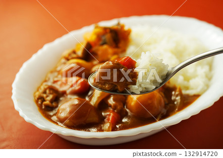 Curry rice with lots of chunky vegetables Curry rice with lots of chunky vegetables 132914720