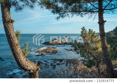 Pier to Red Lighthouse at Naksan Beach, South Korea Pier to Red Lighthouse at Naksan Beach, South Korea 132914775