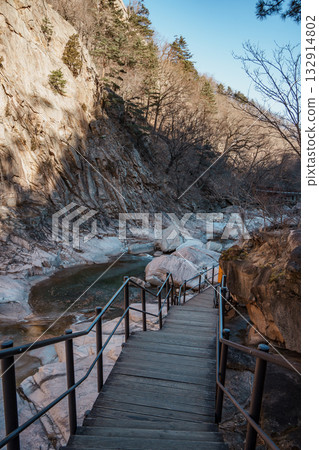 Wooden bridge and rocky stairs in Seoraksan National Park, Sokcho, South Korea Wooden bridge and rocky stairs in Seoraksan National Park, Sokcho, South Korea 132914802