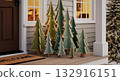 Christmas front porch decorated with wooden fir trees, creating  holiday scene. 132916151