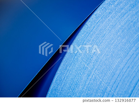 Curved lines of rolled metal are made of sheet steel. Curved lines of rolled metal are made of sheet steel. 132916877