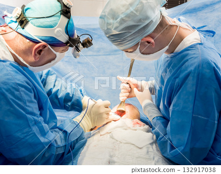 Surgery to remove the breast and replace it with an implant. 132917038