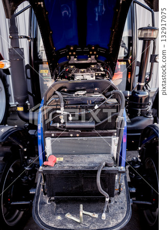 Modern new agricultural tractor engine. Machinery and equipment 132917075