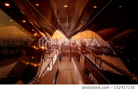 View of harbor with yachts details. Beautiful sunset sky in the marina bay. View of harbor with yachts details. Beautiful sunset sky in the marina bay. 132917138