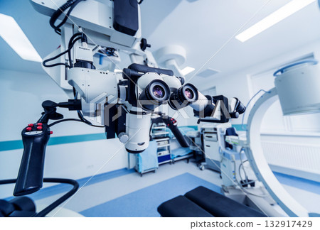 Modern microscope for operations in surgery room at the hospital. Modern microscope for operations in surgery room at the hospital. 132917429