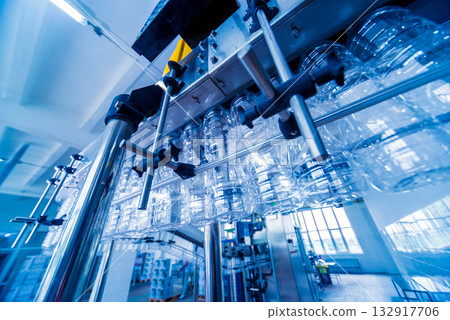 The plastic bottle blowing machine. PET preforms for blowing of plastic bottles 132917706