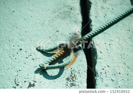 Turquoise painted wall with a metal element. Background image. Grunge. Turquoise painted wall with a metal element. Background image. Grunge. 132918932