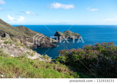 Cliffs and coastline of Taiohae Bay in Nuku Hiva, Marquesas Islands, French Polynesia Cliffs and coastline of Taiohae Bay in Nuku Hiva, Marquesas Islands, French Polynesia 132919233