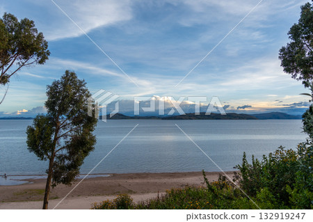 Lush green landscape overlooking Lake Titicaca from Llachon, Peru Lush green landscape overlooking Lake Titicaca from Llachon, Peru 132919247